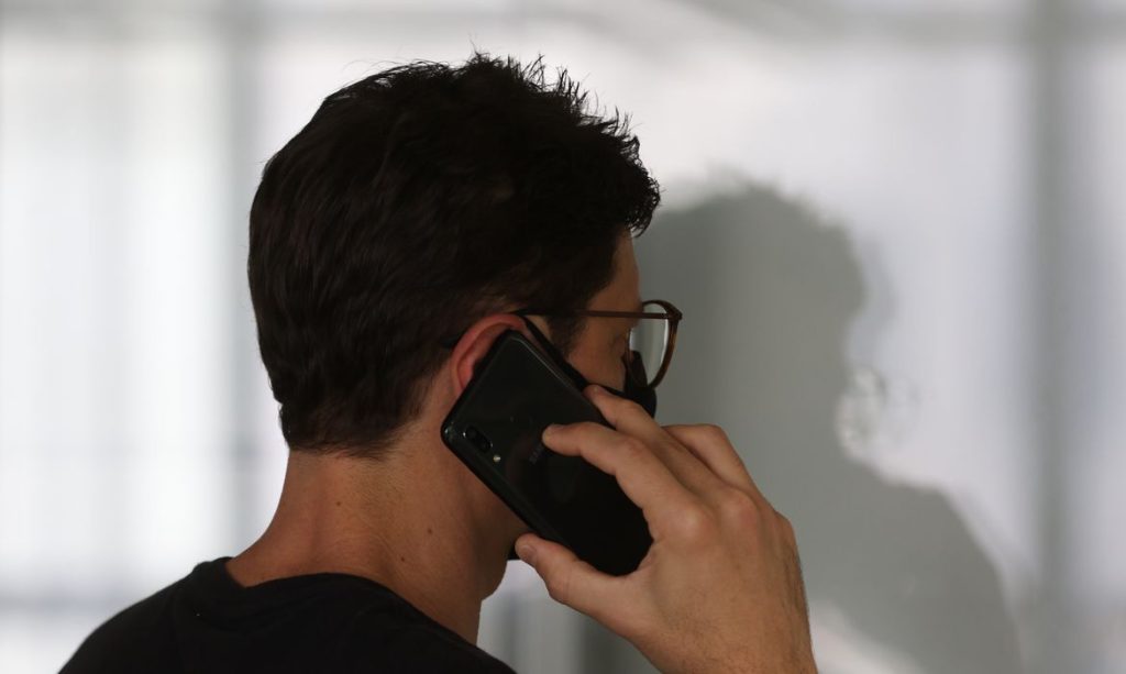 celular x telefone